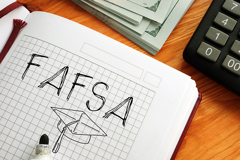 Free Application for Federal Student Aid FAFSA is shown on a photo using the text